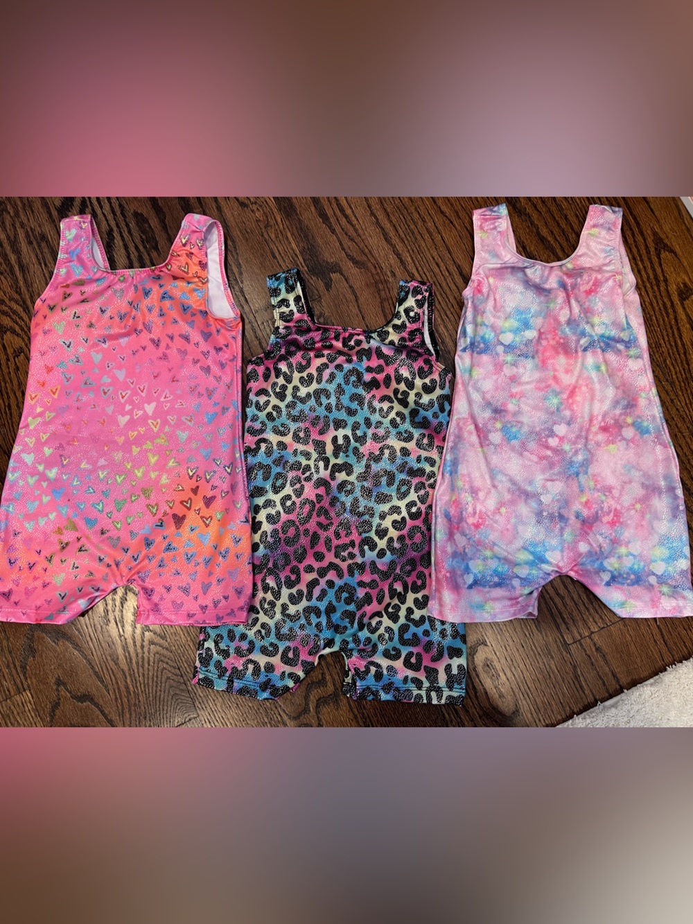 Like new! Bundle of 3 girls gymnastics leotards